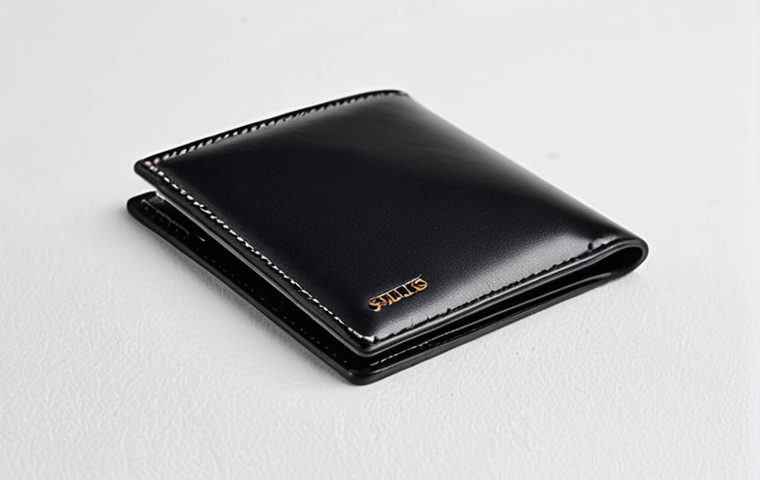 **
"A minimalist Acne Studios card wallet in black leather, laying on a clean white surface, professional product photography, showcasing the wallet's simple design and high-quality stitching, safe for work, appropriate content, fully clothed, professional, perfect anatomy, natural proportions."
**